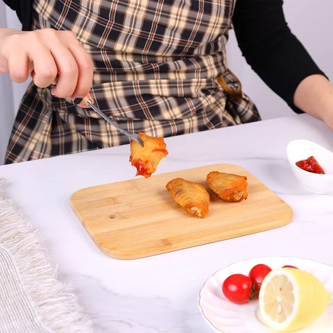 HTB natural bamboo closeup highlights durable, knife-friendly surface.