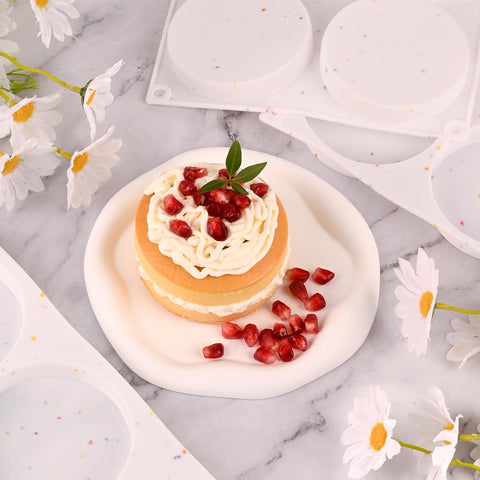 HUAKENER silicone round mold with six cavities in 3-8 inch size for mini cakes.