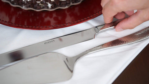 Hudson Essentials elegant dessert setup with hammered stainless steel tools.