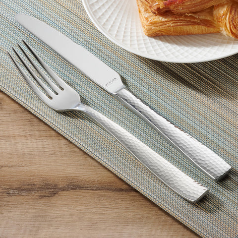 Hudson Essentials hammered flatware on table during dinner party for elegance