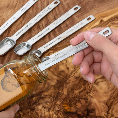 Hudson Essentials stackable spoons organized in a drawer for easy access