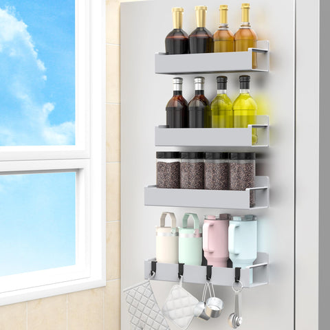 HuggieGems four pack magnetic spice rack on fridge holding bottles securely.