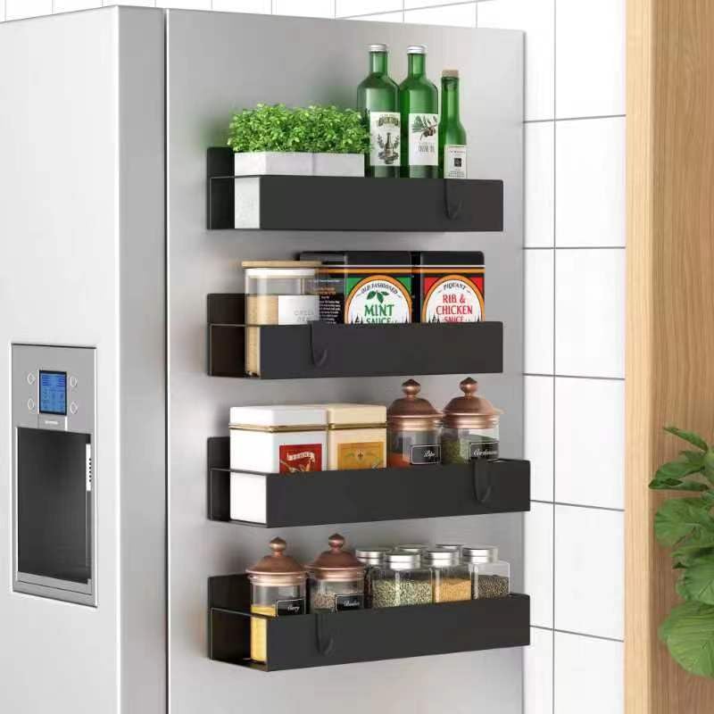 HuggieGems magnetic spice rack on fridge side offers quick access and organized jars.