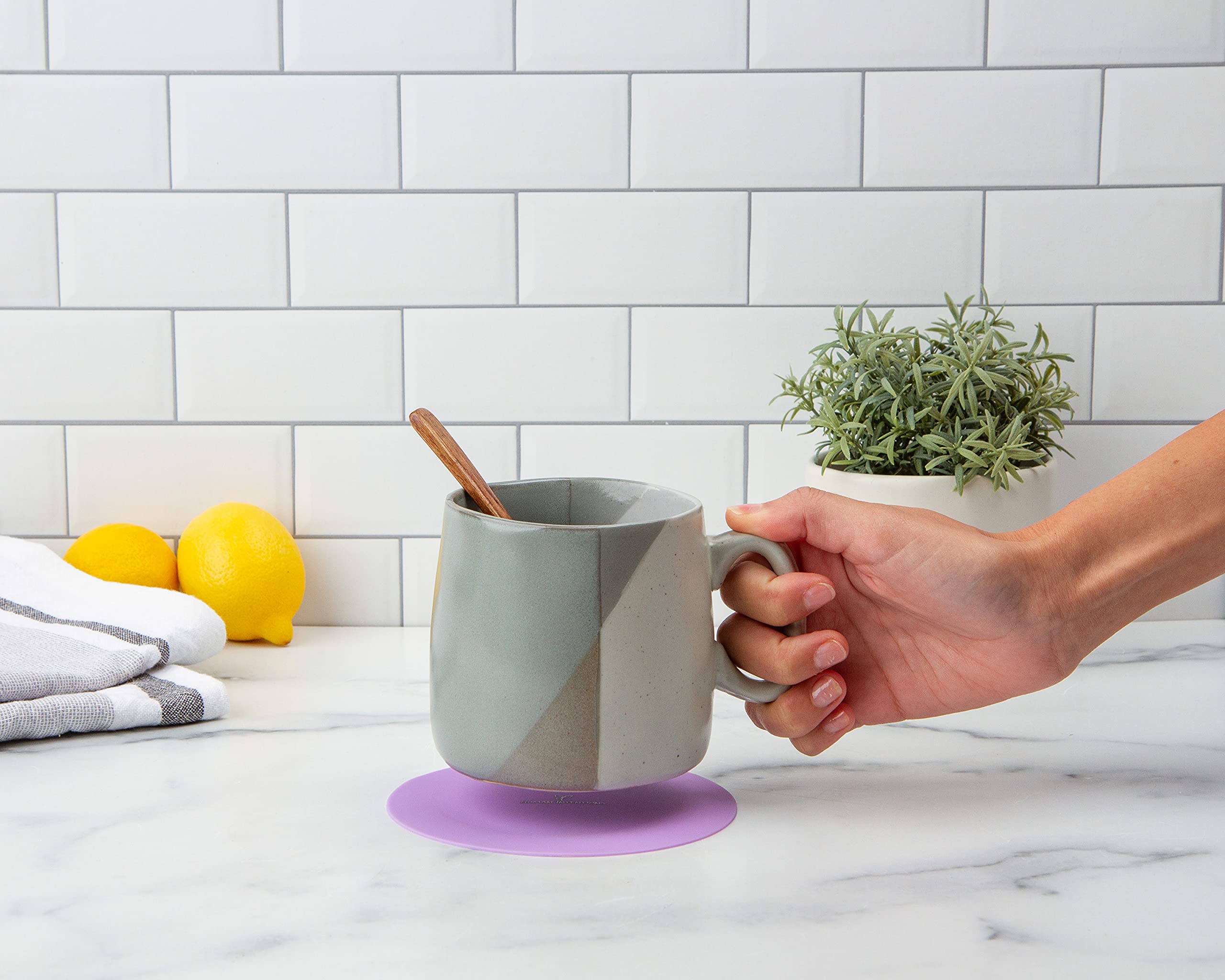 Human Intentions coaster protects surfaces with non-slip, heat-resistant design