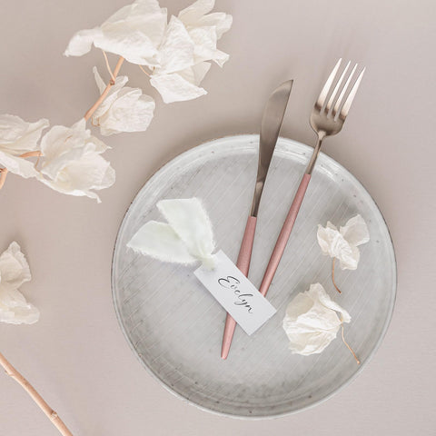 Humyoun ivory name cards add refined table decoration and labeling.