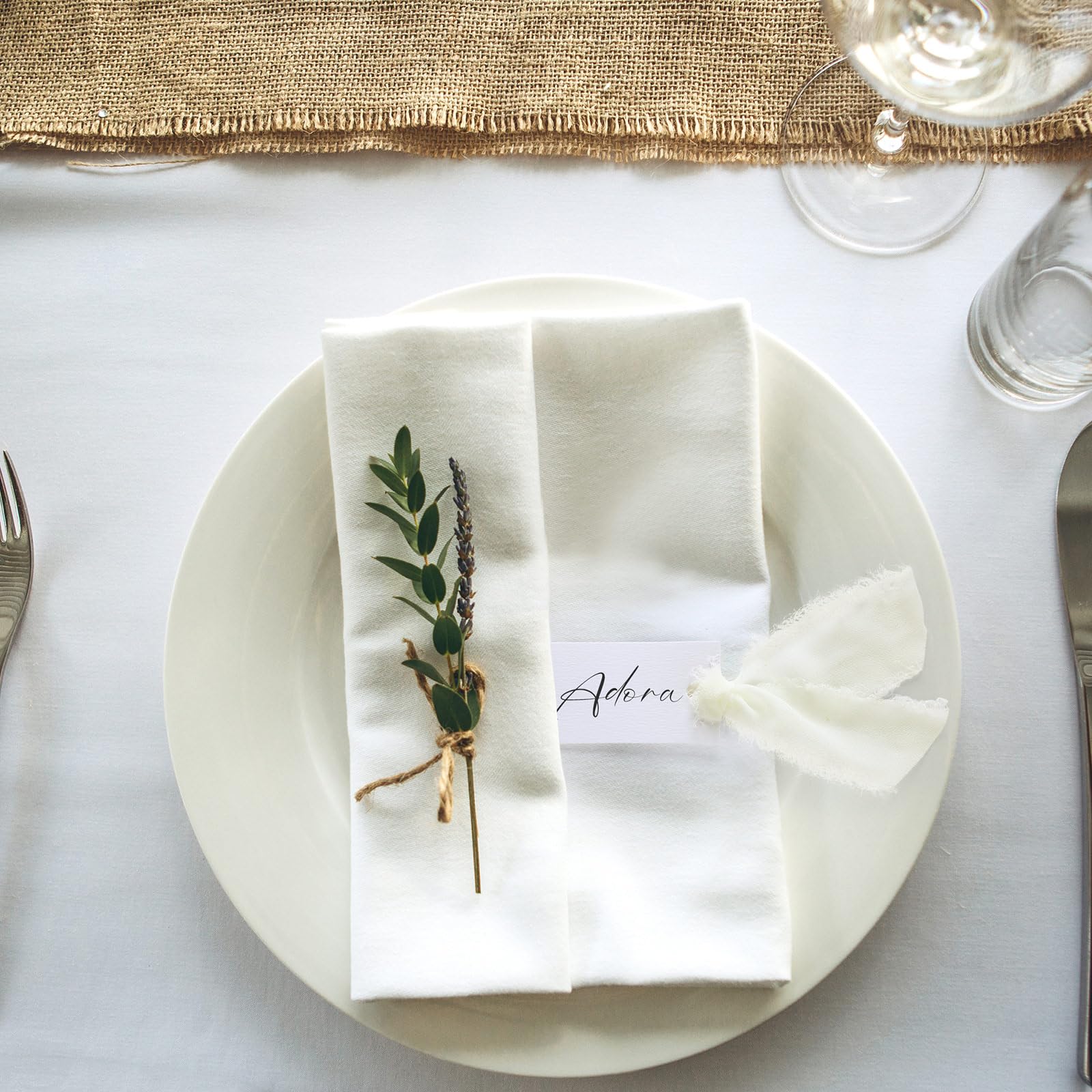 Humyoun wedding setup with ivory name cards and ribbons.