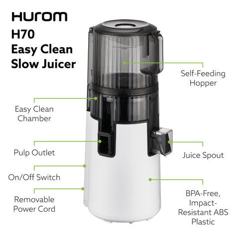 Hurom H70 juicing carrots and greens for fresh daily juice.