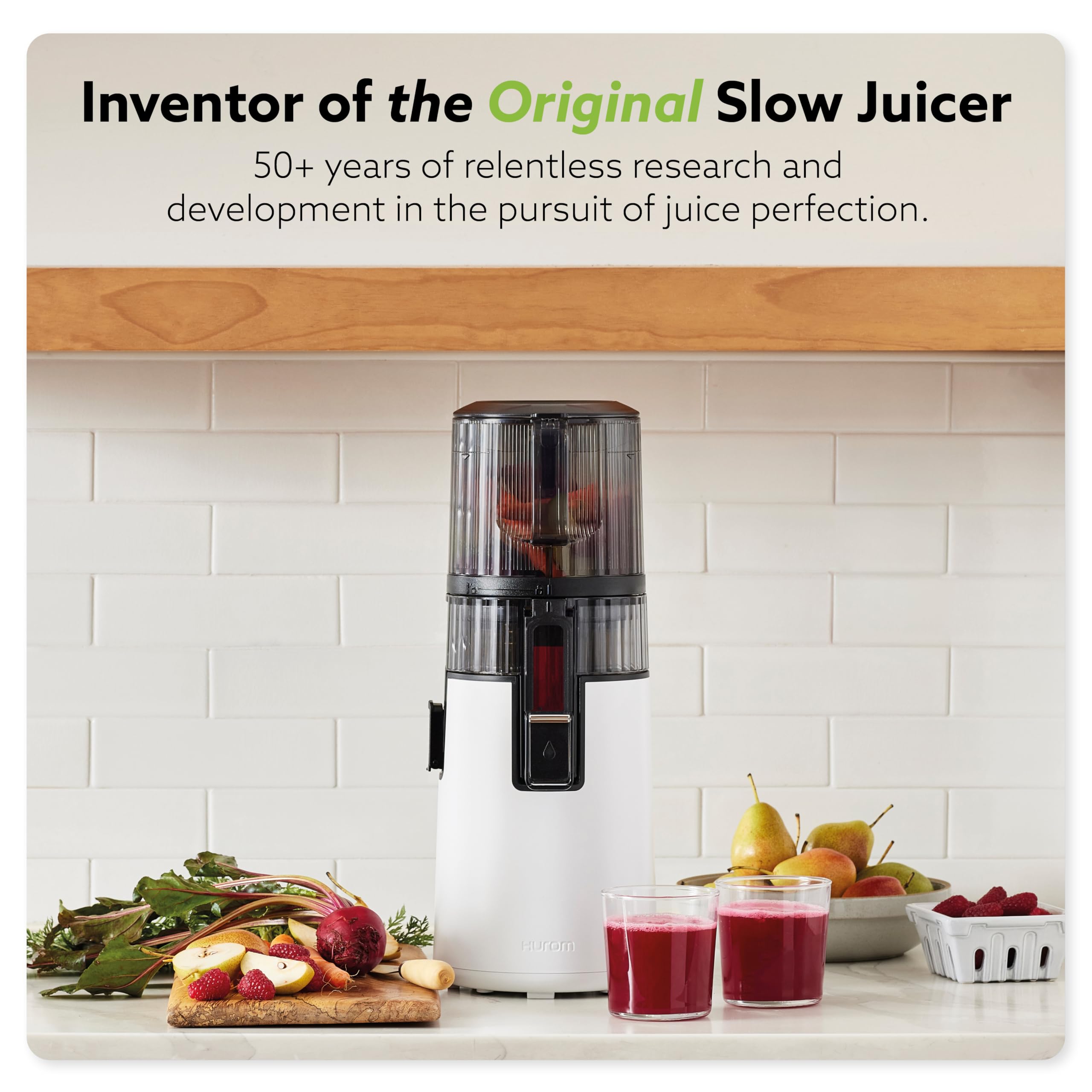Hurom H70 wide-mouth hopper for easy ingredient loading.