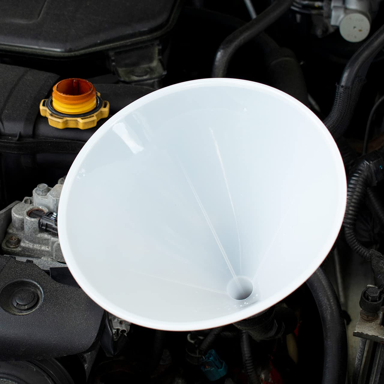 Hutzler 64oz funnel side pour, heat resistant polyethylene ideal for labs or kitchens