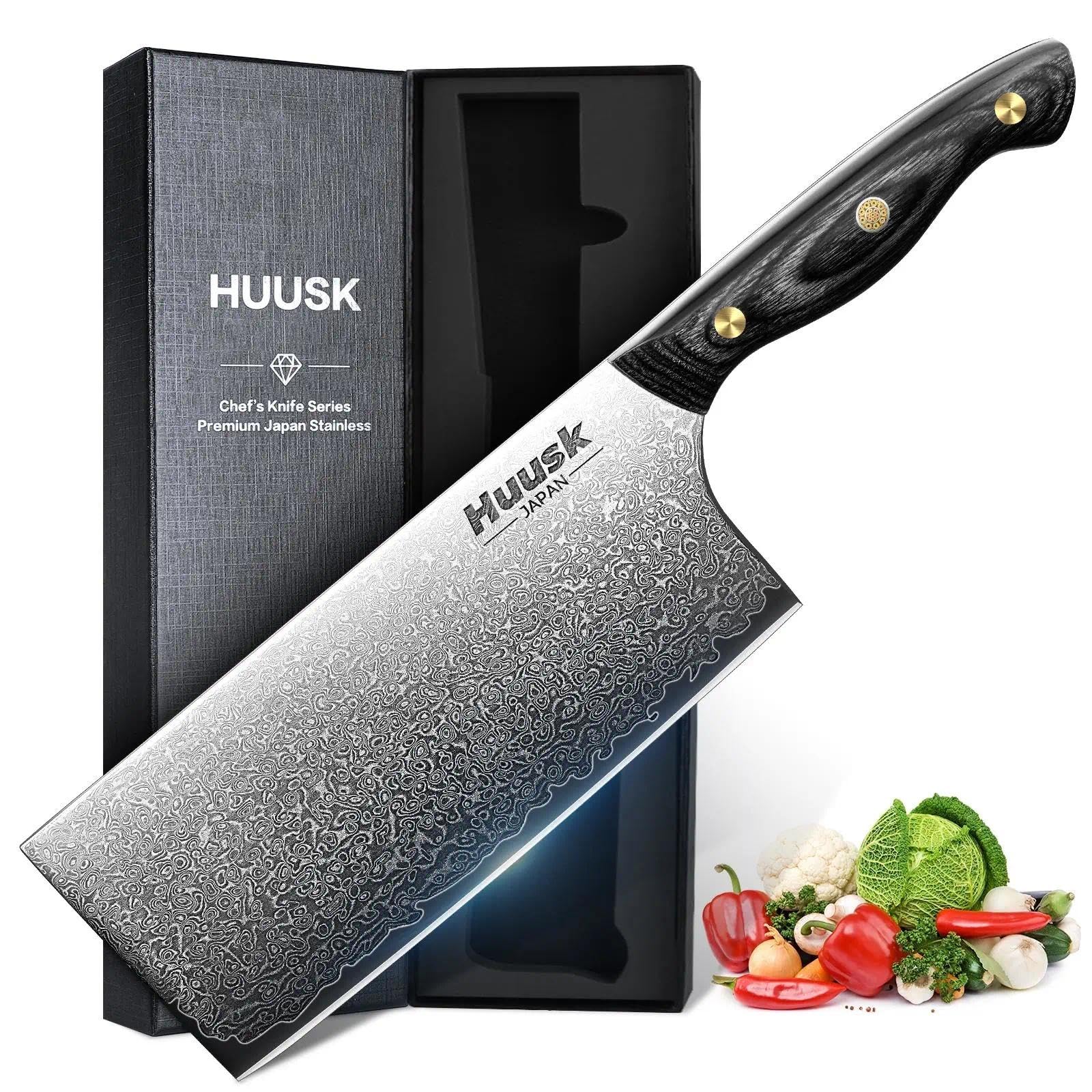 Huusk Damascus cleaver blade close-up showing a sharp edge for precise chops.