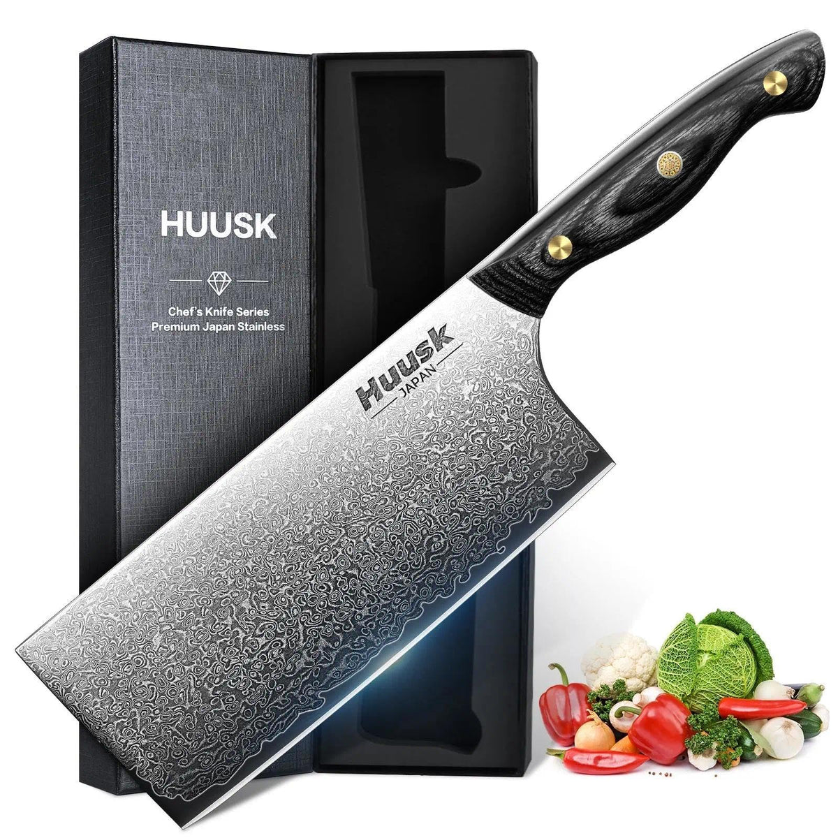 Huusk Damascus cleaver blade close-up showing a sharp edge for precise chops.