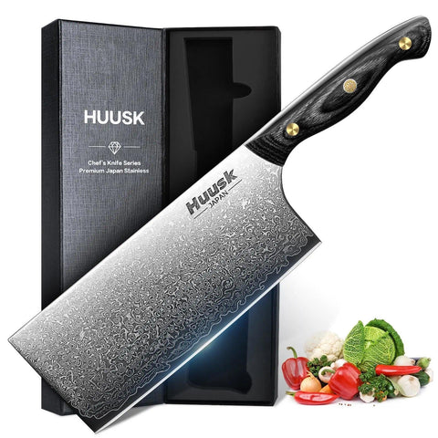 Huusk Damascus cleaver blade close-up showing a sharp edge for precise chops.