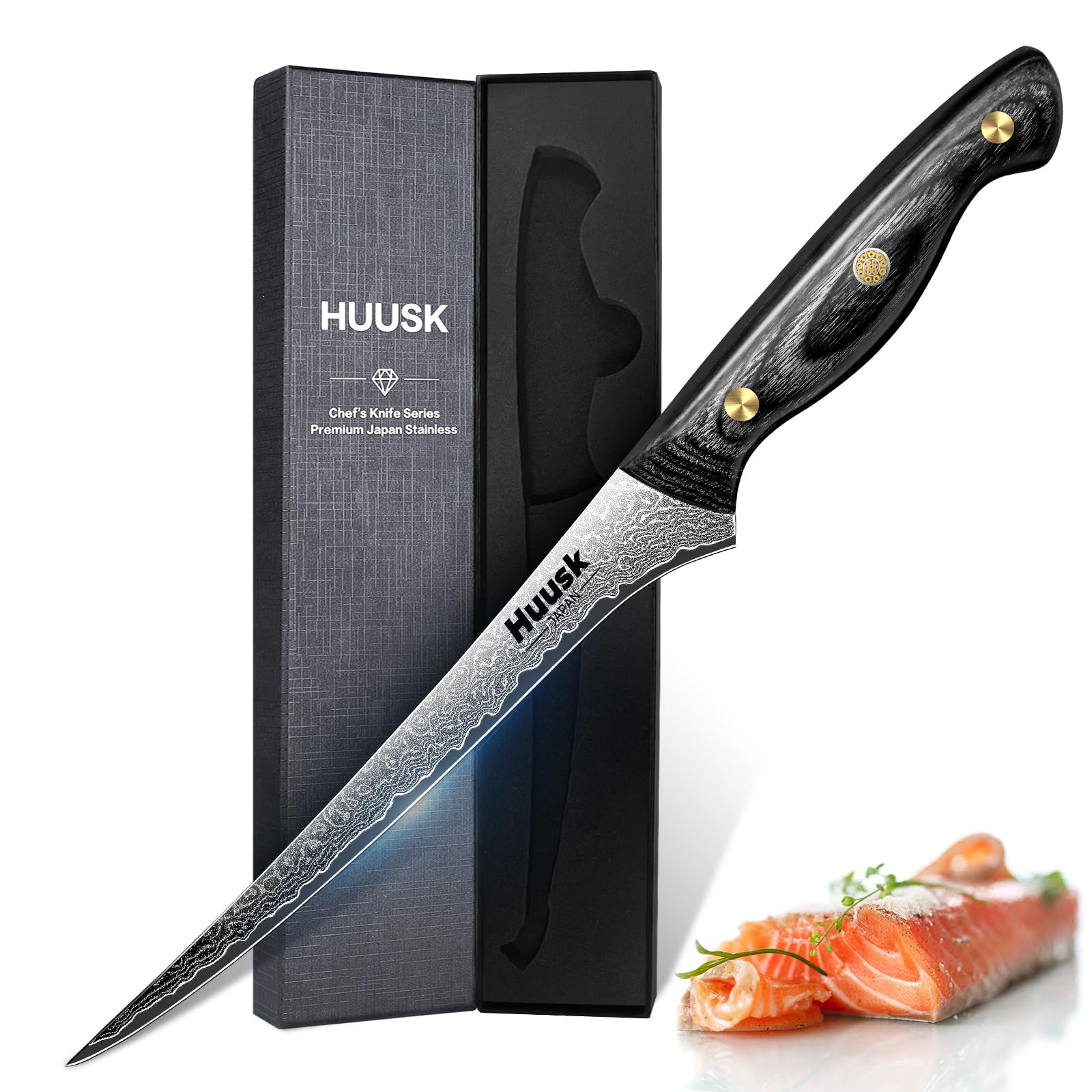 Huusk Damascus fish fillet knife close-up highlighting blade pattern and craftsmanship.