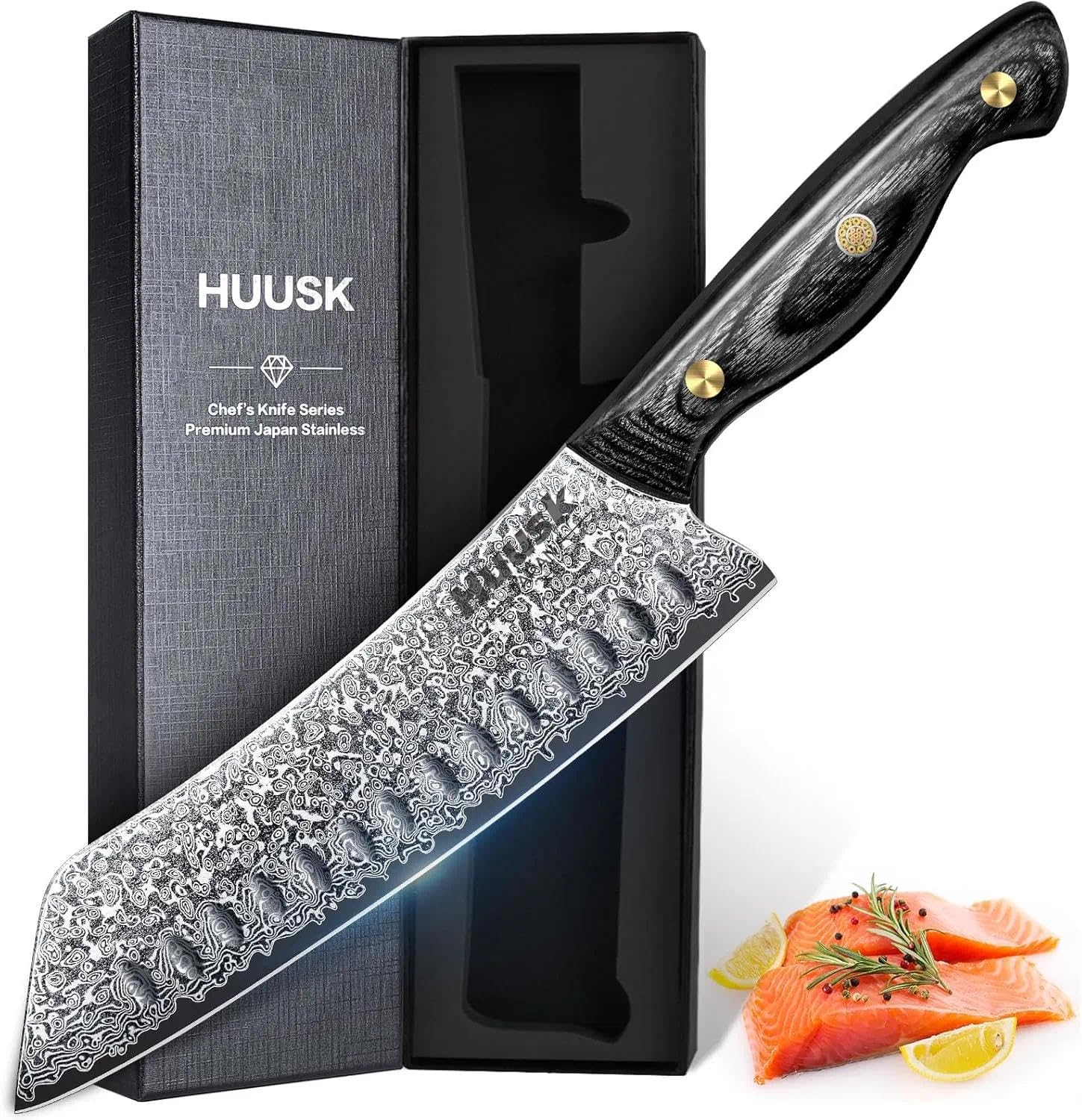 Huusk Damascus Kiritsuke knife edge close-up highlighting precision cutting