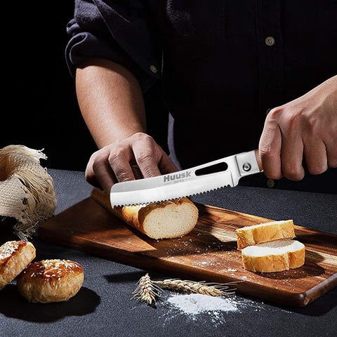 Huusk folding bread knife wide-wavy-edge highlights smooth cuts of crust and crumb