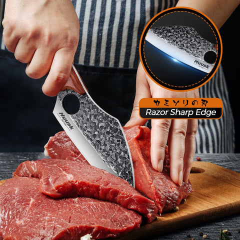 Huusk meat cleaver in sheath ready for outdoor cooking and camping