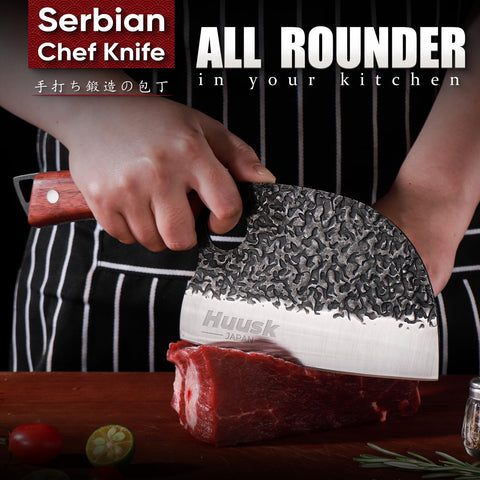 Huusk Serbian chef knife blade close-up highlighting sharp carving potential