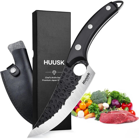 Huusk Viking Knife blade close-up shows ultra sharp edge for precise cuts.