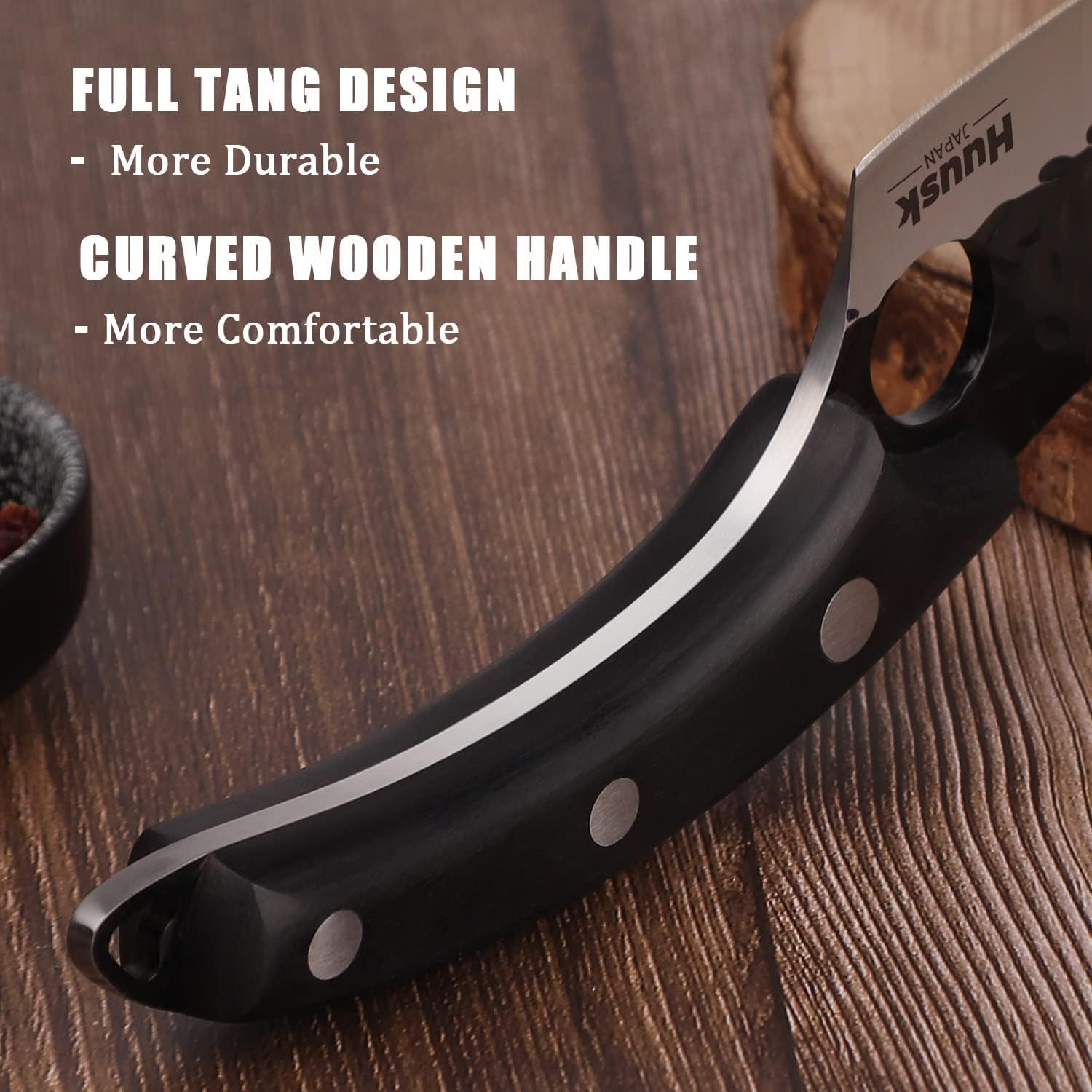 Huusk Viking Knife carving steak with sharp edge for clean slices.