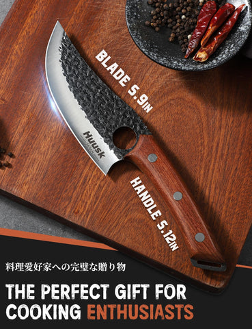 Huusk Viking Knife in action highlights precise control for meat cutting and BBQ