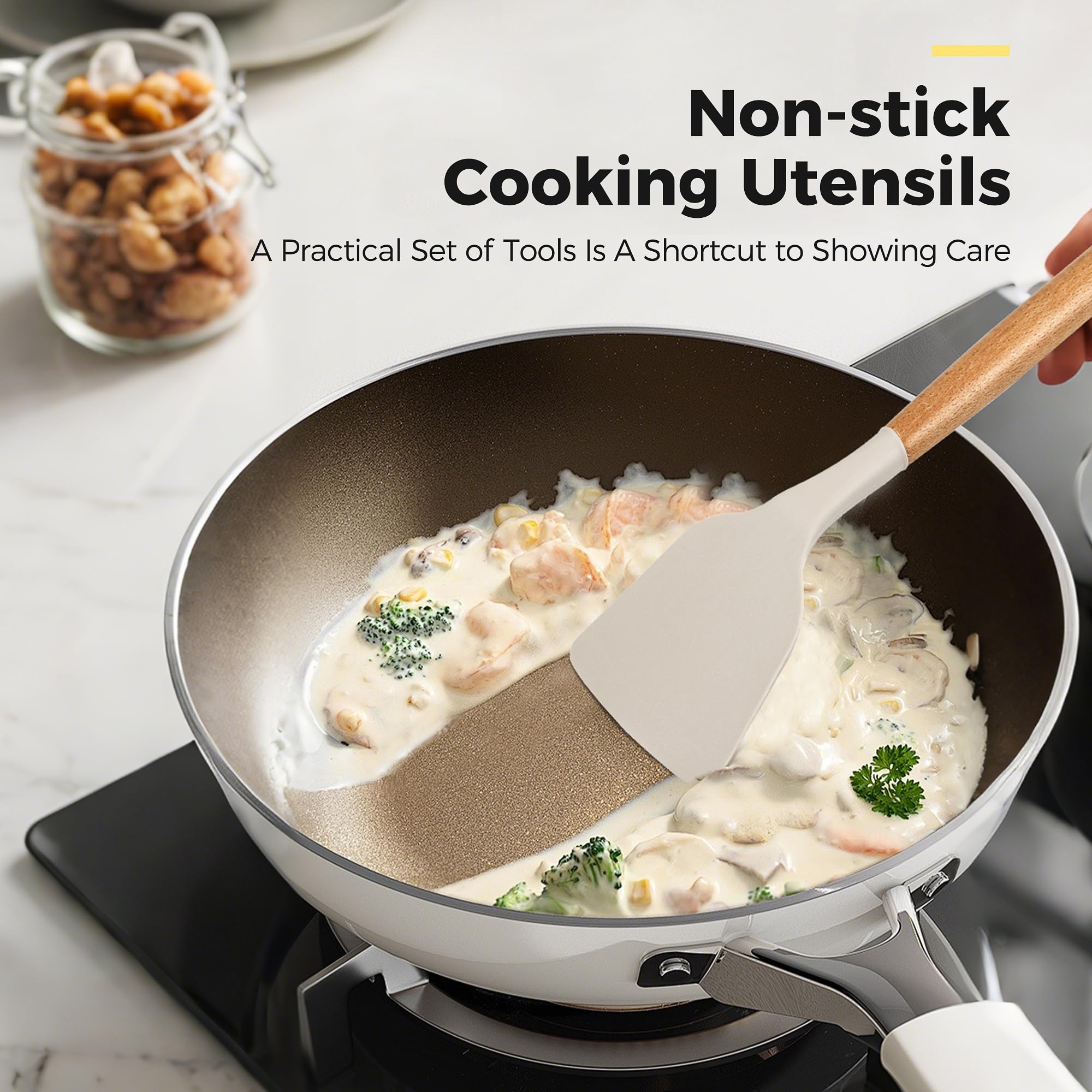 Hvygss ladle and tongs set with heat-resistant heads for soups and grilling.
