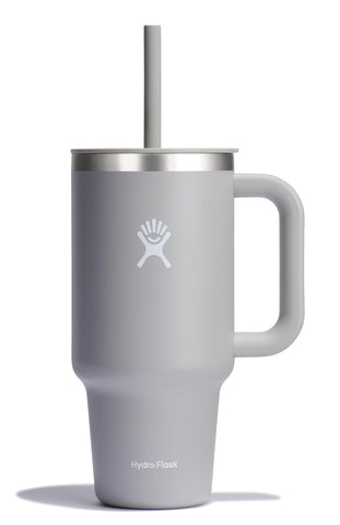 Hydro Flask 32 oz Travel Tumbler in Birch with handle and straw, keeps beverages cold longer.