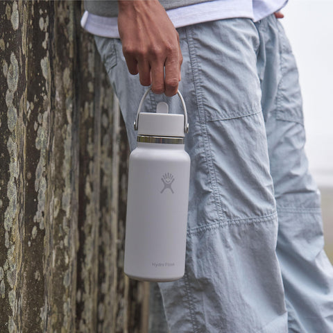 Hydro Flask 40oz wide-mouth bottle with Flex Straw Cap in use.