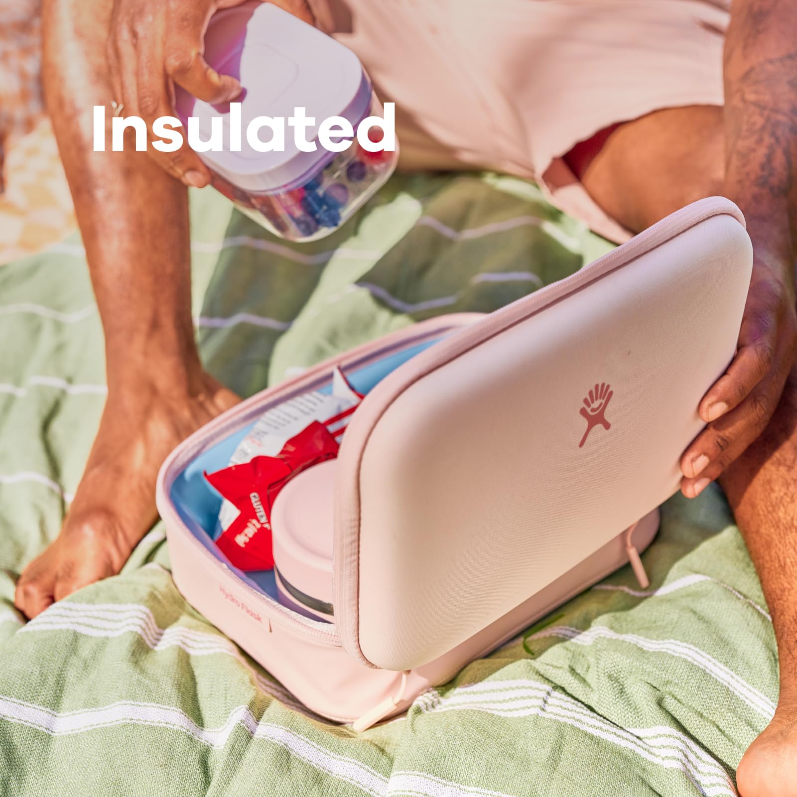 Hydro Flask Carry Out Lunch Box compression-molded lid and base for stability.