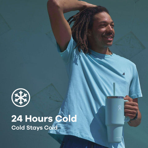 Hydro Flask cupholder-fit travel tumbler supports beverages on road trips.
