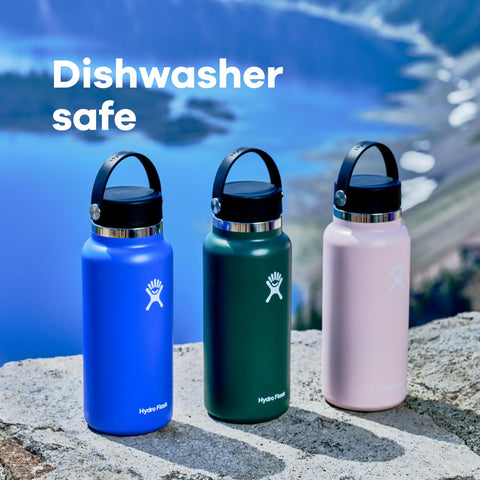 Hydro Flask dishwasher-safe stainless bottle being cleaned.