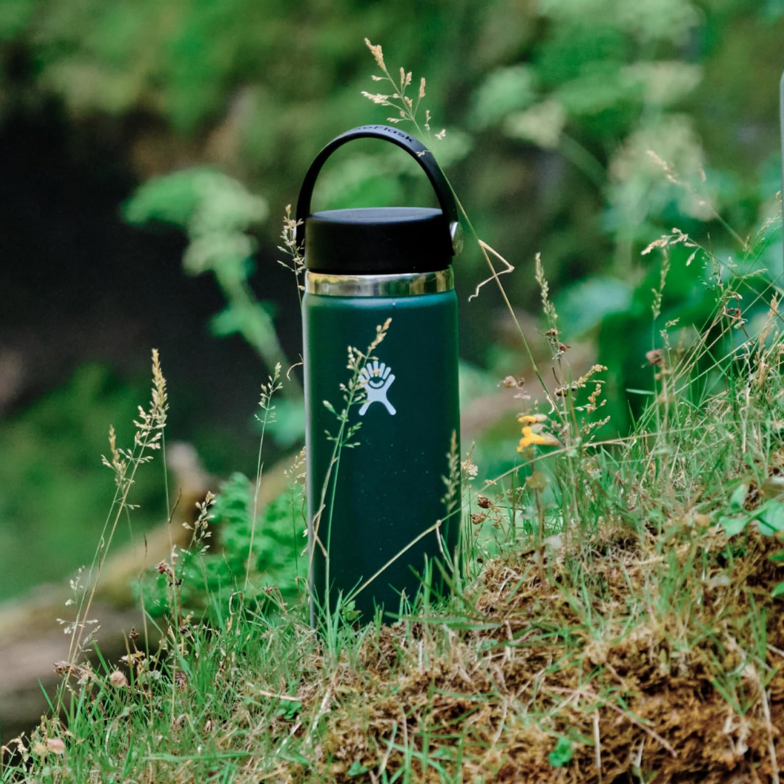 Hydro Flask bottle outdoors highlighting insulation for cold drinks.