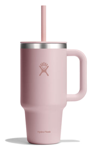 Hydro Flask Travel Tumbler 32oz with pink handle for easy portability.