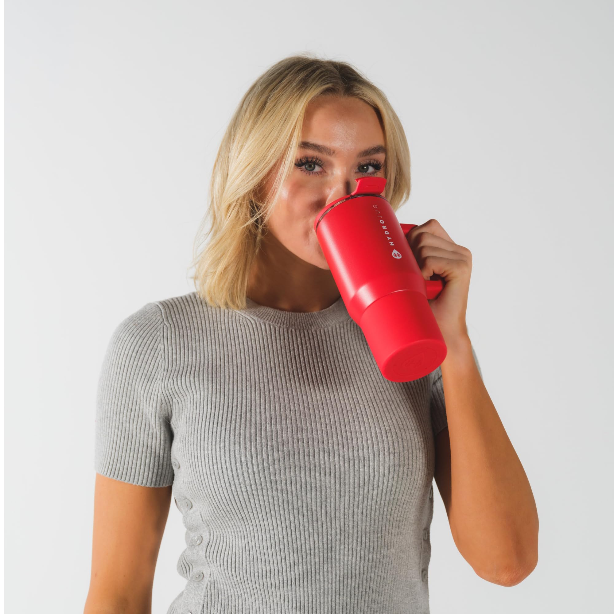 HydroJug daily-use commute-ready design in Alumni Red keeps coffee within reach.