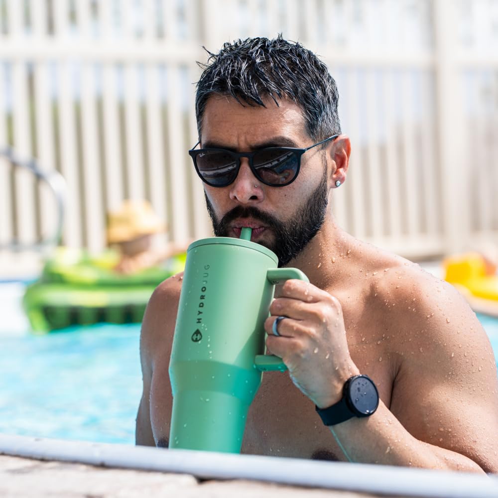 HydroJug Traveler Sage fits standard car cup holders for travel convenience.