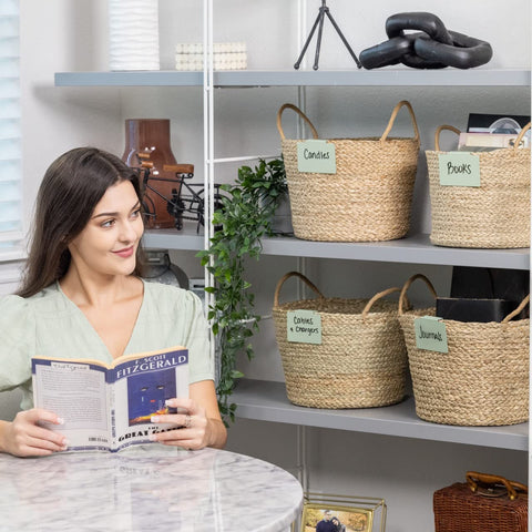 Hygge & Sage labels on wicker baskets for easy identification.