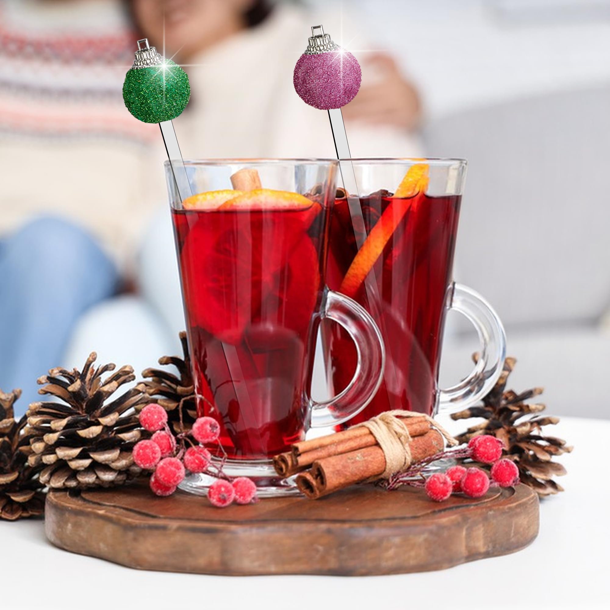 Iceyyyy Christmas glitter ball stirrer with red top adds color to cocktails