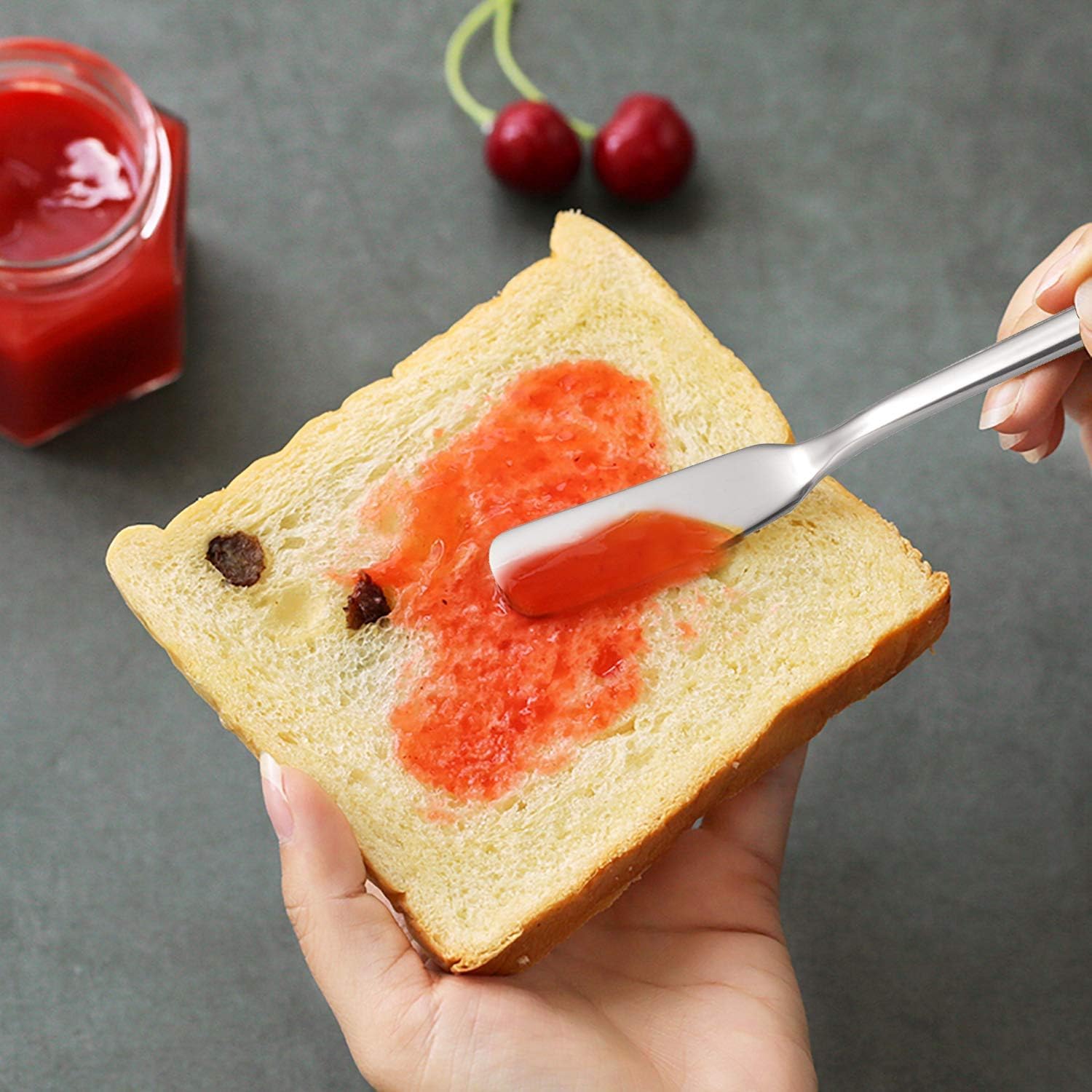 IMEEA stainless steel butter knife with a polished finish for easy cleaning.