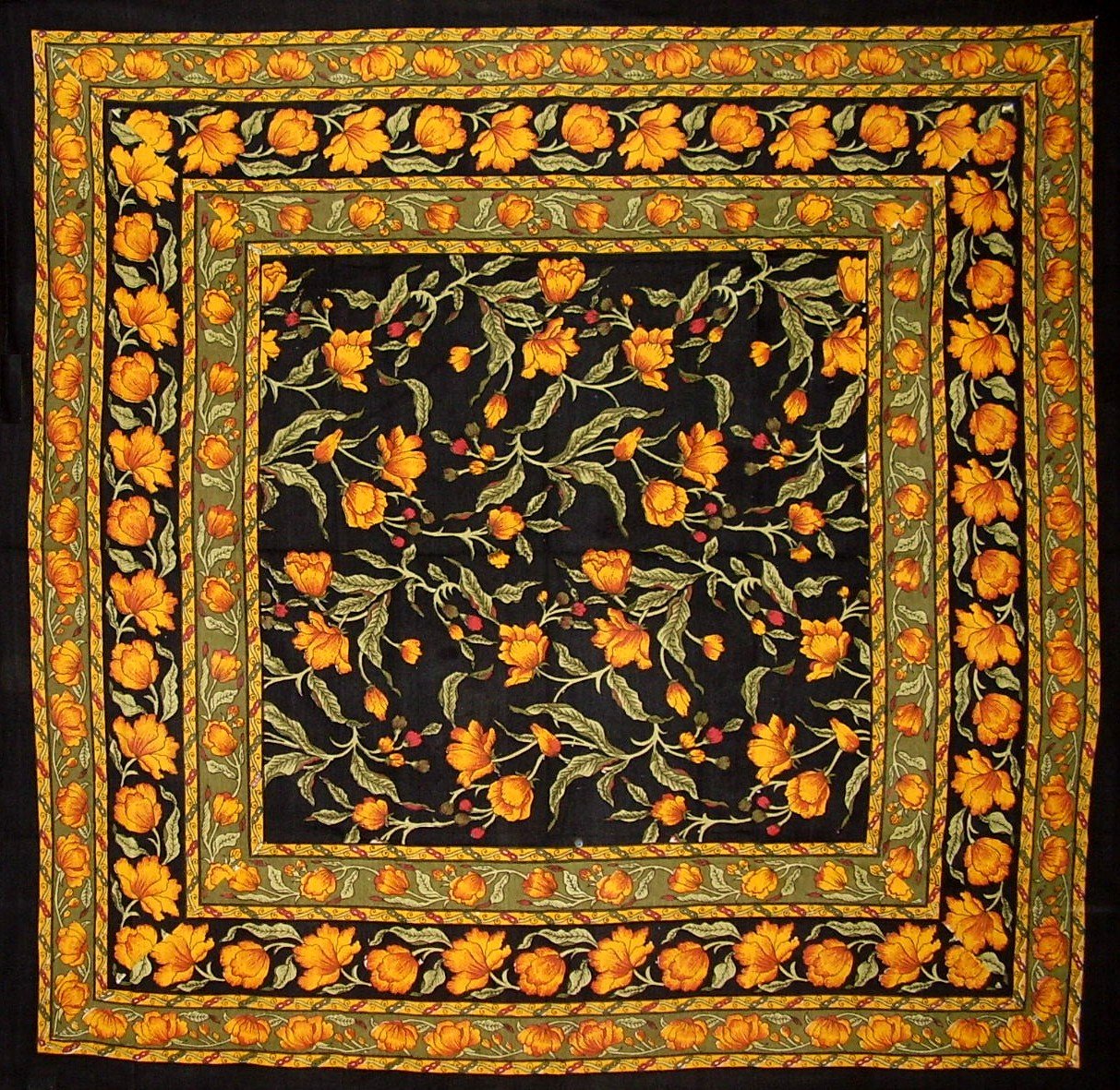 India Arts French Floral tablecloth in amber on black enhances elegant dining ambience