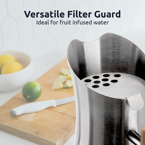 Invigorated Water pH Vitality pitcher pours water into a glass