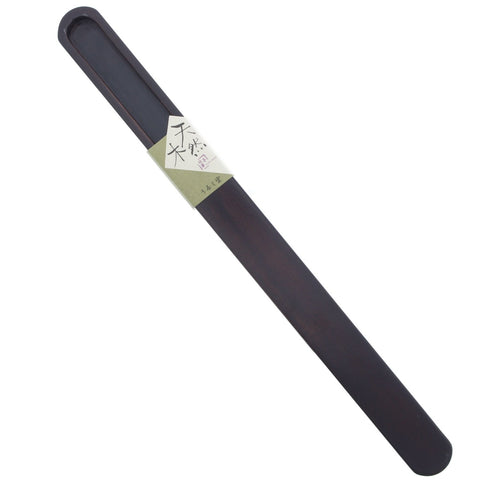 Ishida Daruma lacquer detail on wood highlights moisture-friendly finish.
