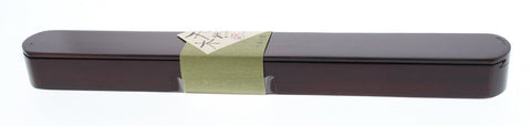 Ishida Daruma wood grain close-up showing natural texture.