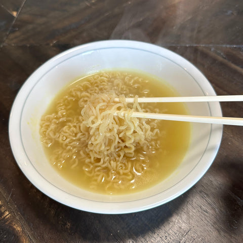 Island Dogs Helping Hands chopsticks invite a whimsical touch with their tiny hand ends.