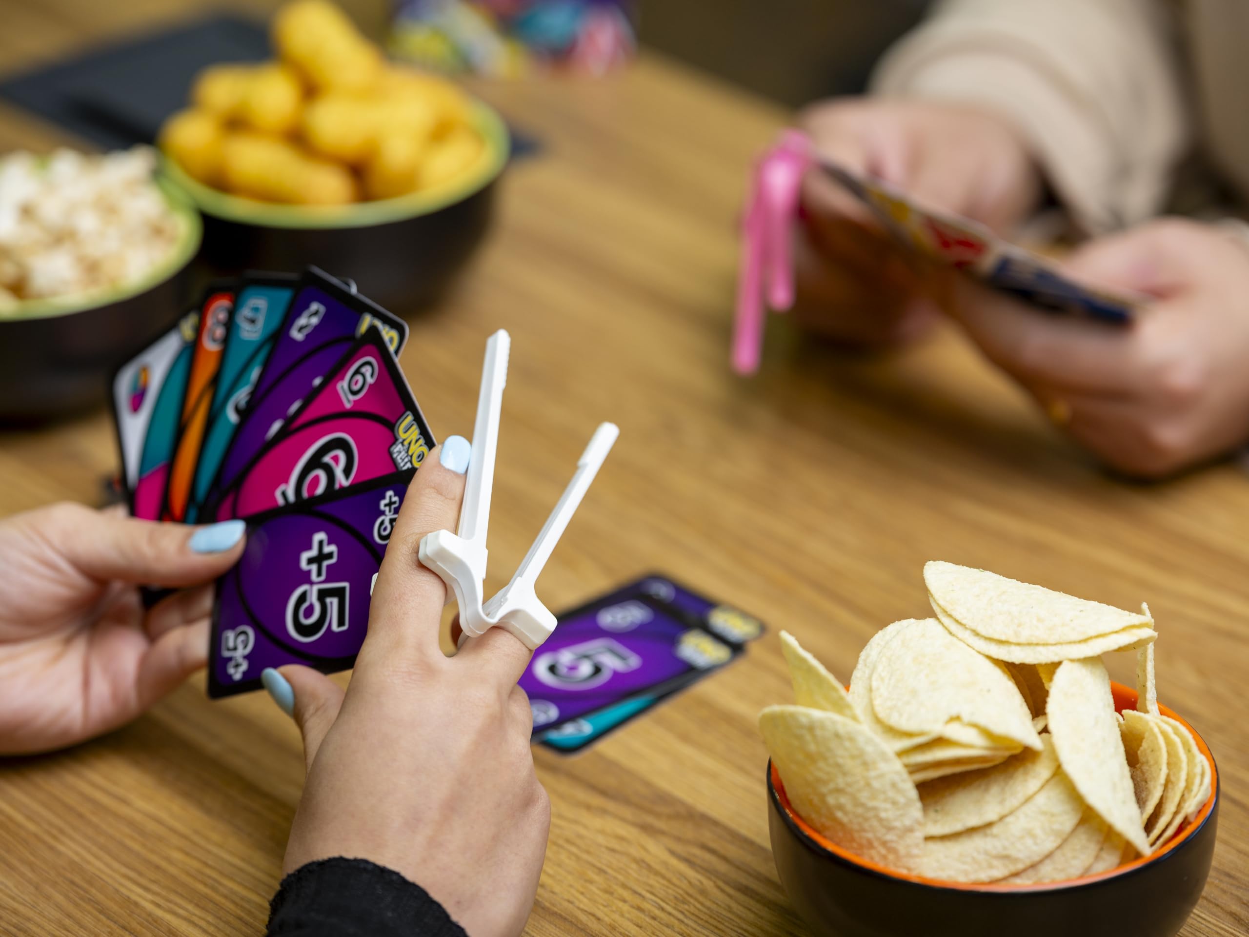 isnack pro snack grabber in action, convenient for chips and nuts