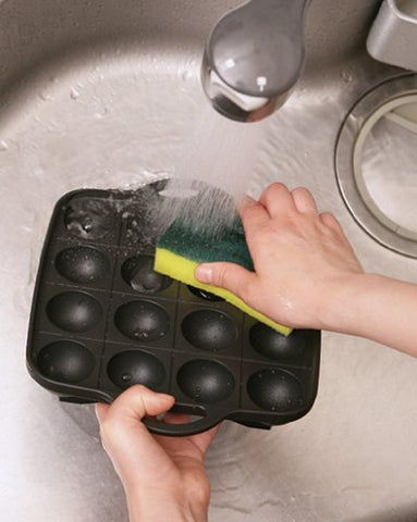 Iwatani non-stick coating on cast aluminum surface aids food release and cleanup.