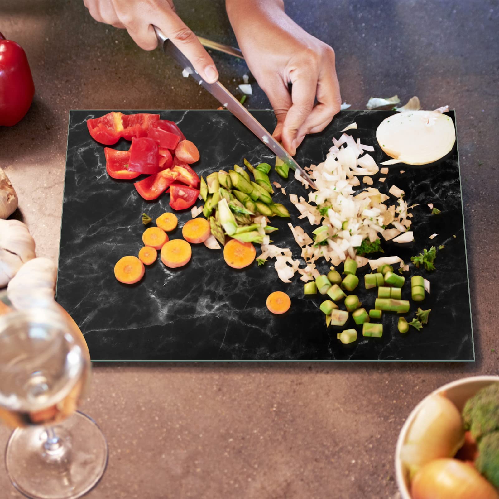 JAMBALAY cutting board with non-slip pads stays stable during chopping.