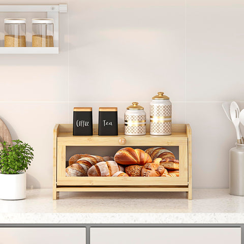 JANSNIMEN bread box keeps other items organized on a flat surface.
