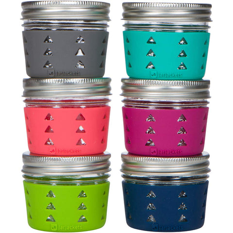 JarJackets silicone sleeve on a multicolor 4oz mason jar for grip.