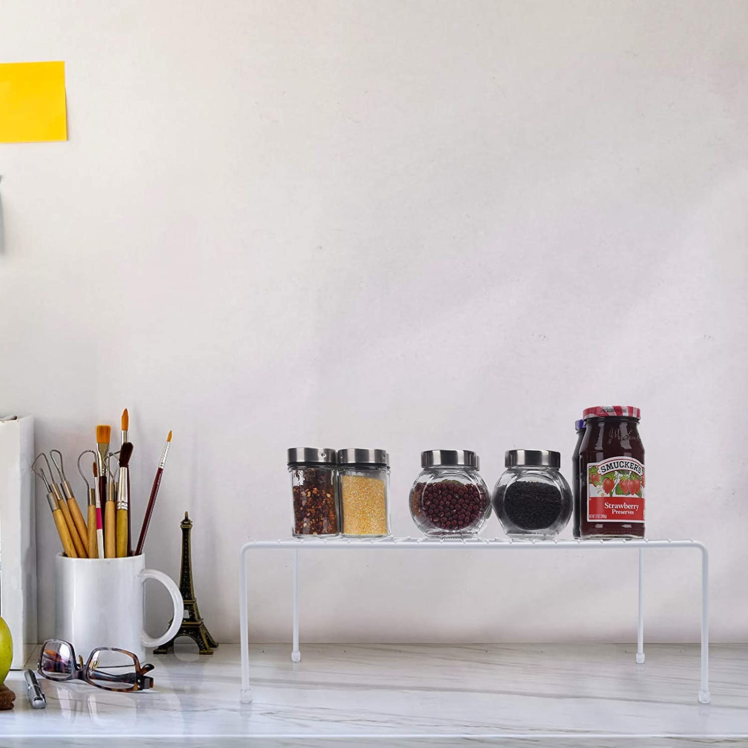JBESUHI steel shelves with non-slip feet protect surfaces.