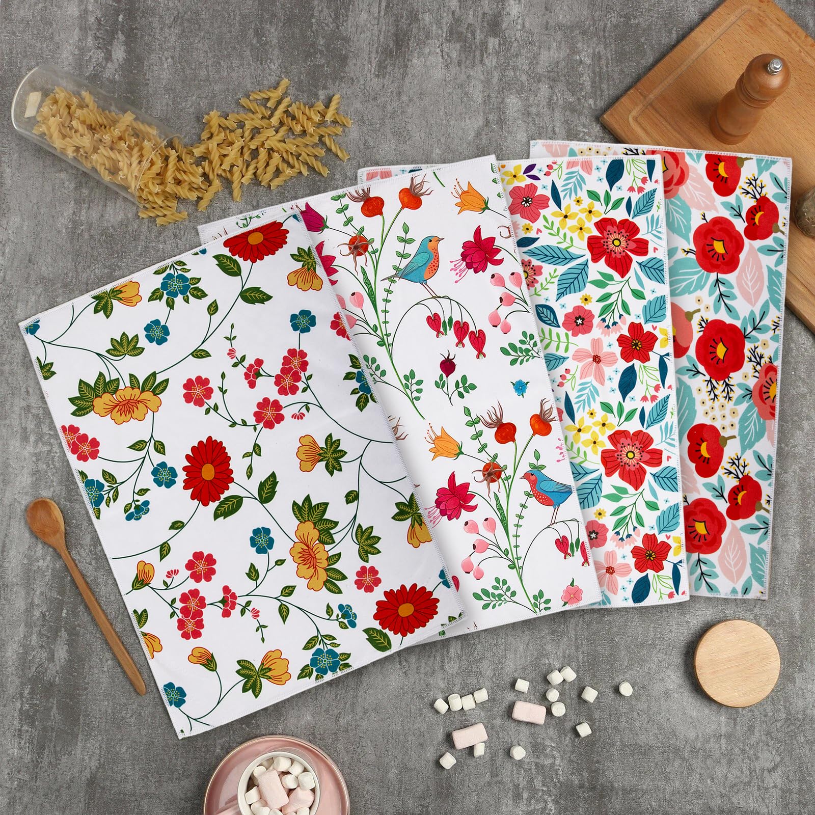 Close-up of flower and bird designs on JDGHGB towels for holiday charm.