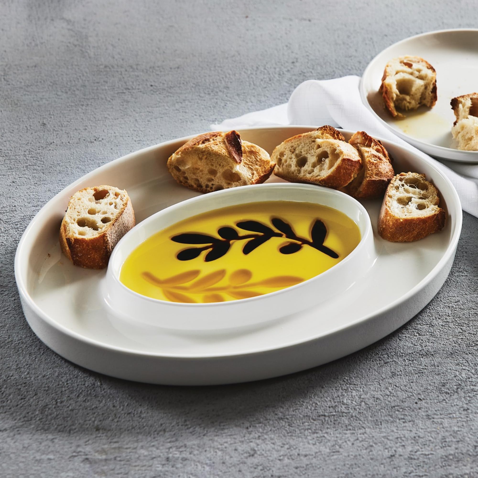 Jeanne Fitz party trays and platters elevate small gatherings with stylish presentation.